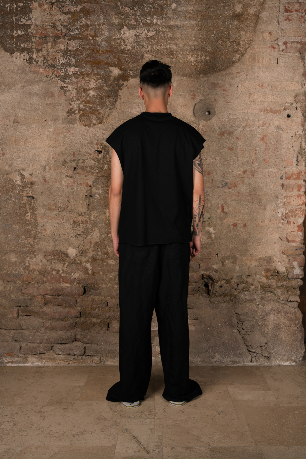 Who is Destino Tank Top Black