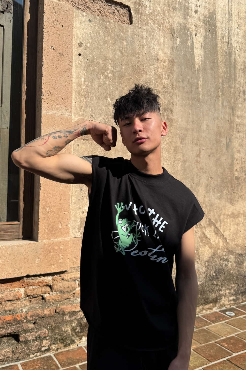 Who is Destino Tank Top Black